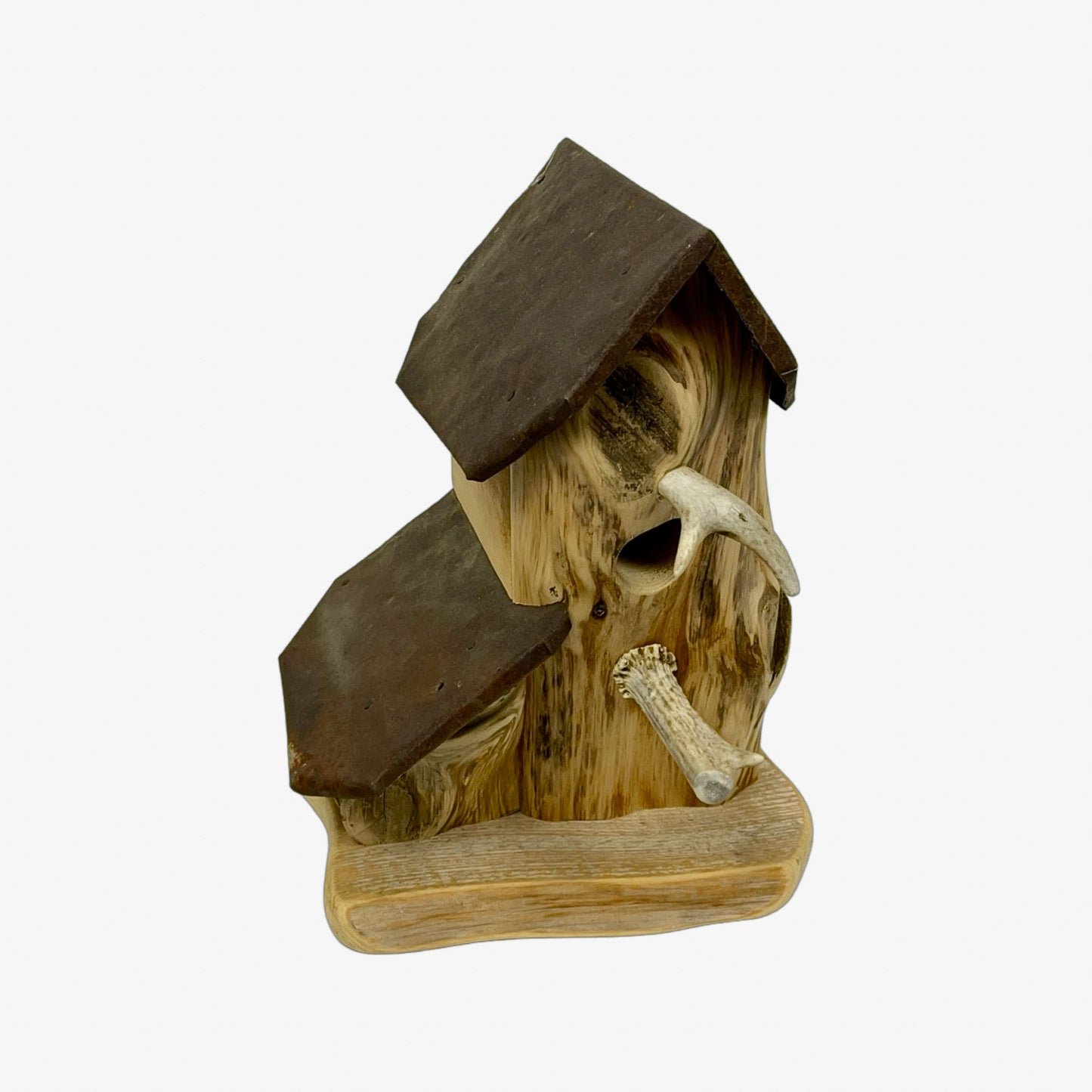 A hand made Bird House made from Cedar Wood