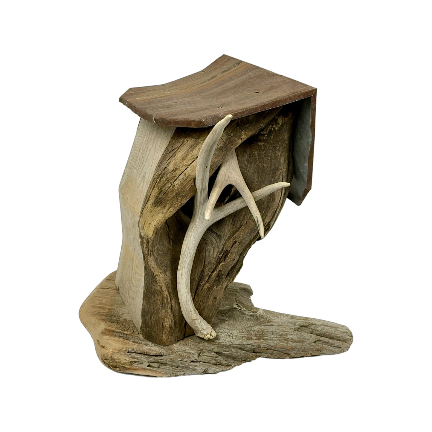 A hand made Bird House made from Flotted Wood