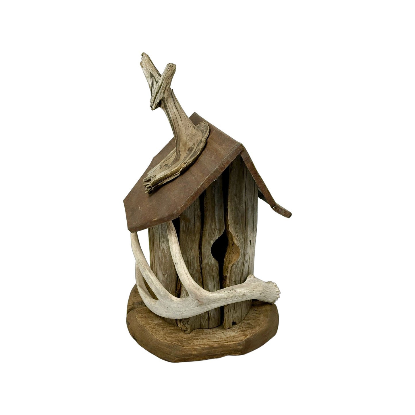 A hand made Bird House made from Flotted Wood