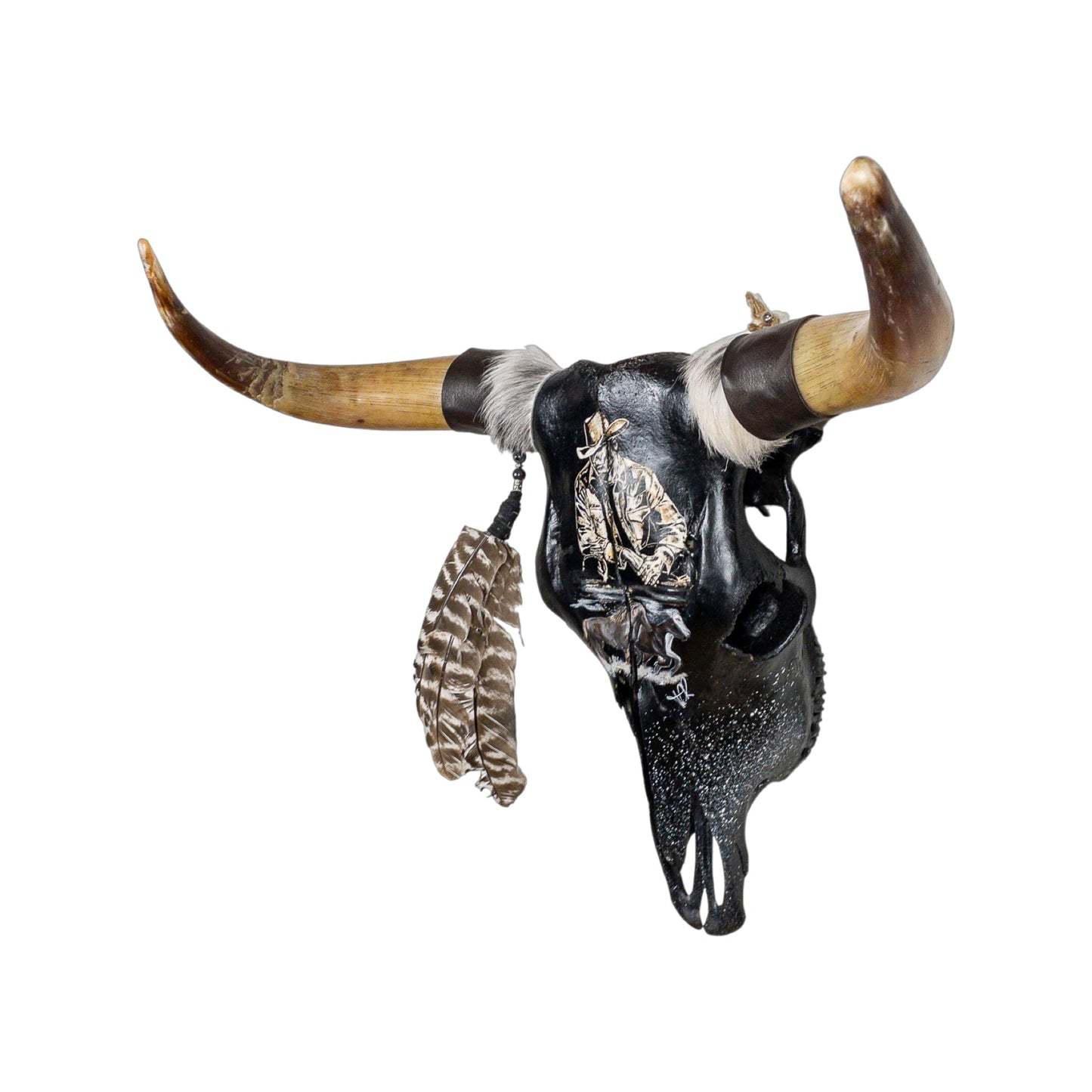 A Longhorn Engraved Skull Taxidermy Wall Decor featuring a cowboy with horses