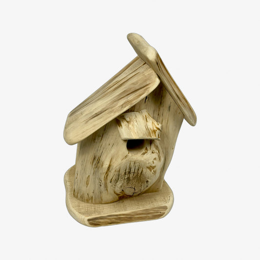 A hand made Bird House made from Cedar Wood
