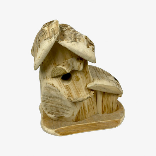 A hand made Bird House made from Cedar Wood