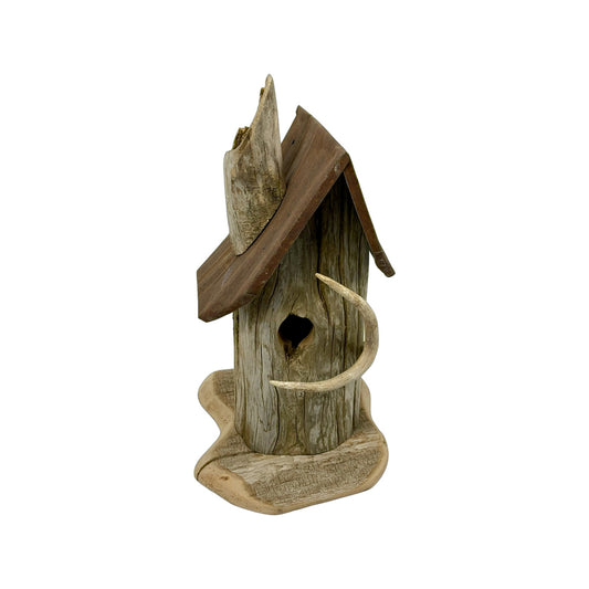 A hand made Bird House made from Flotted Wood