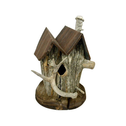 A hand made Bird House made from Flotted Wood