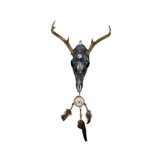 A White-Tailed Deer Engraved Skull Taxidermy Wall Decor featuring a wolf and a dream catcher